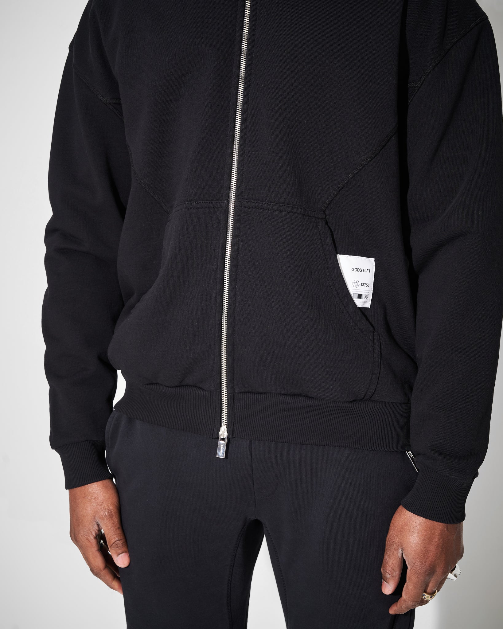 mid section close up of black heavyweight hoodie