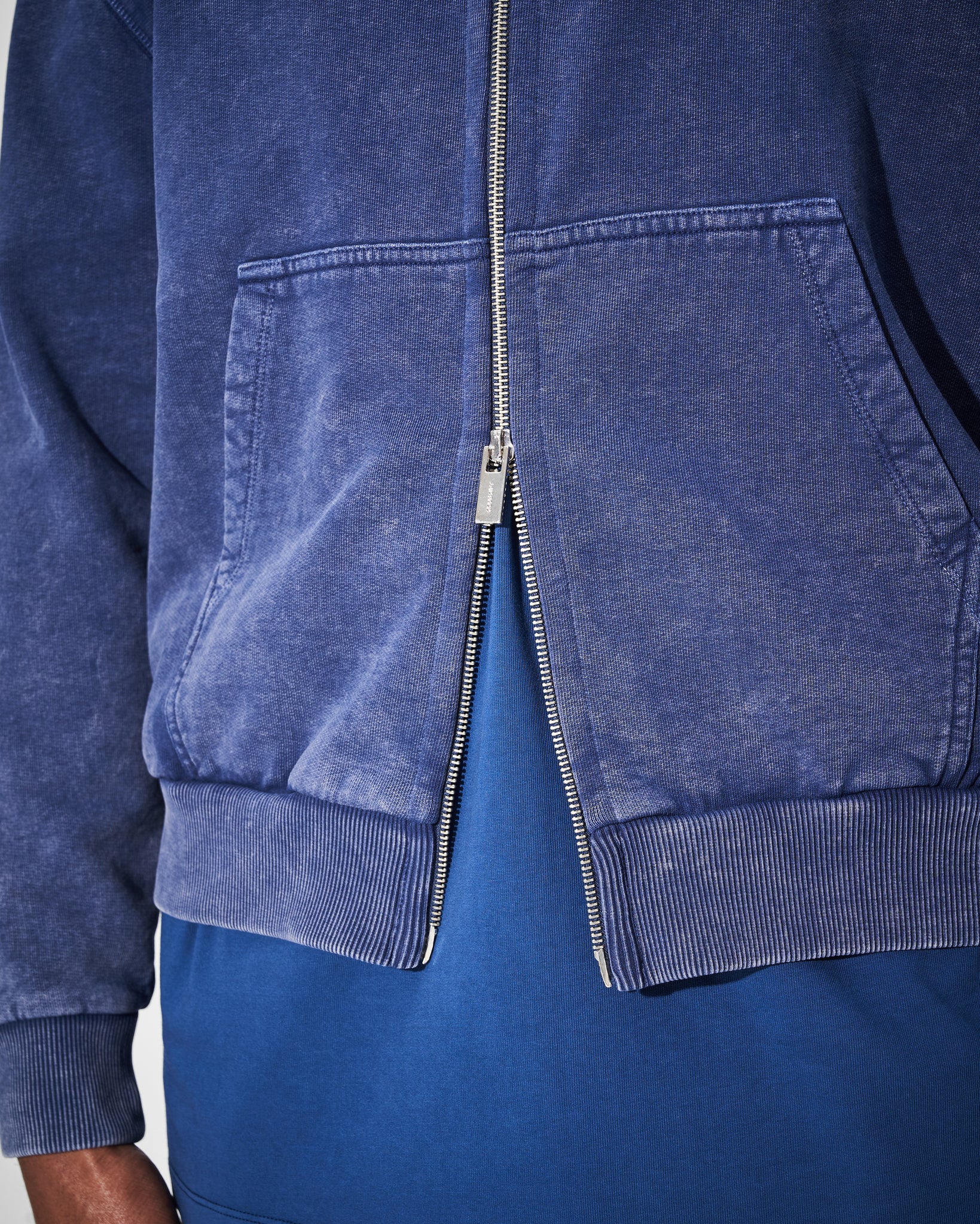 double zip detail of blue acid wash heavyweight hoodie