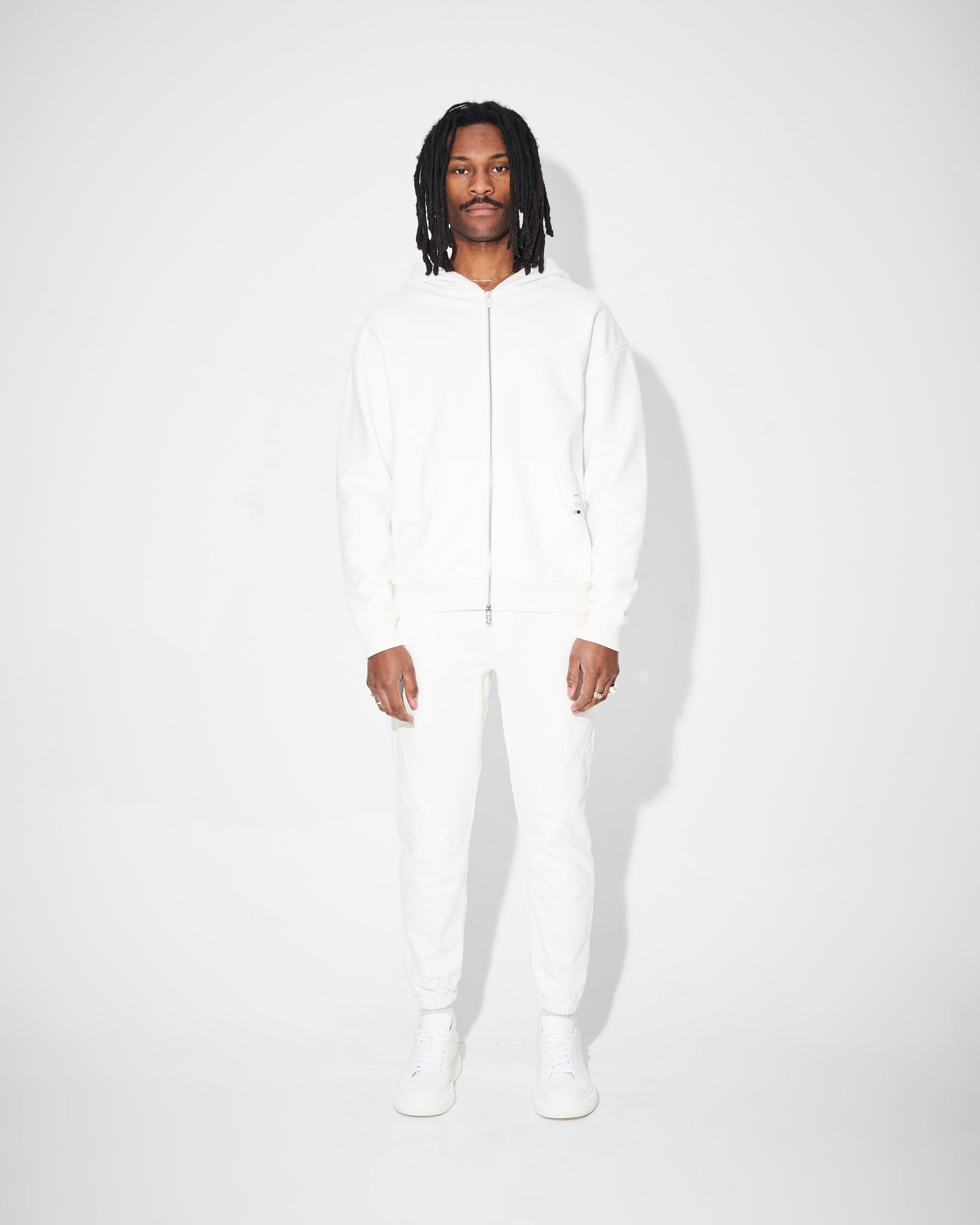 white zip up tracksuit
