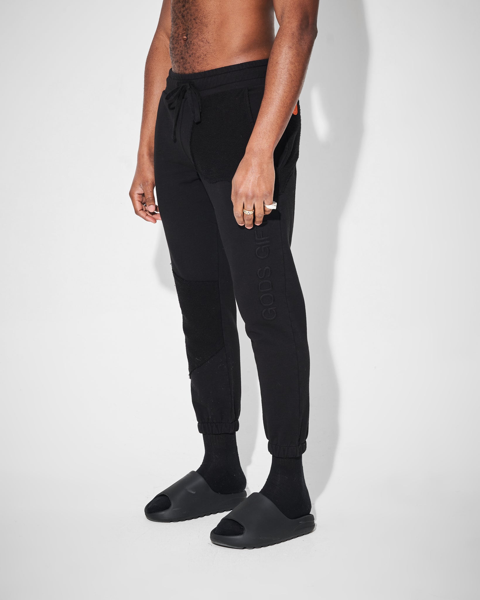 side view of black heavyweight joggers